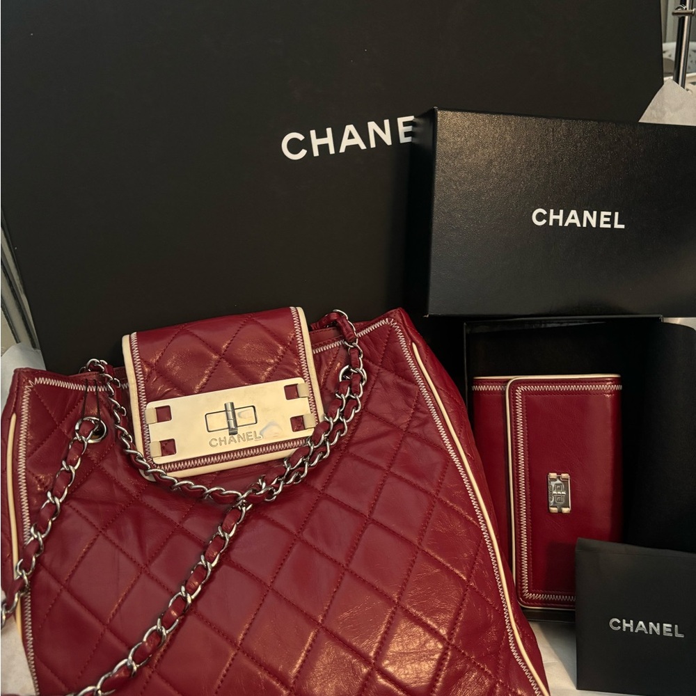 Authentic chanel lambskin North South accordion bag and matching stitch wallet.